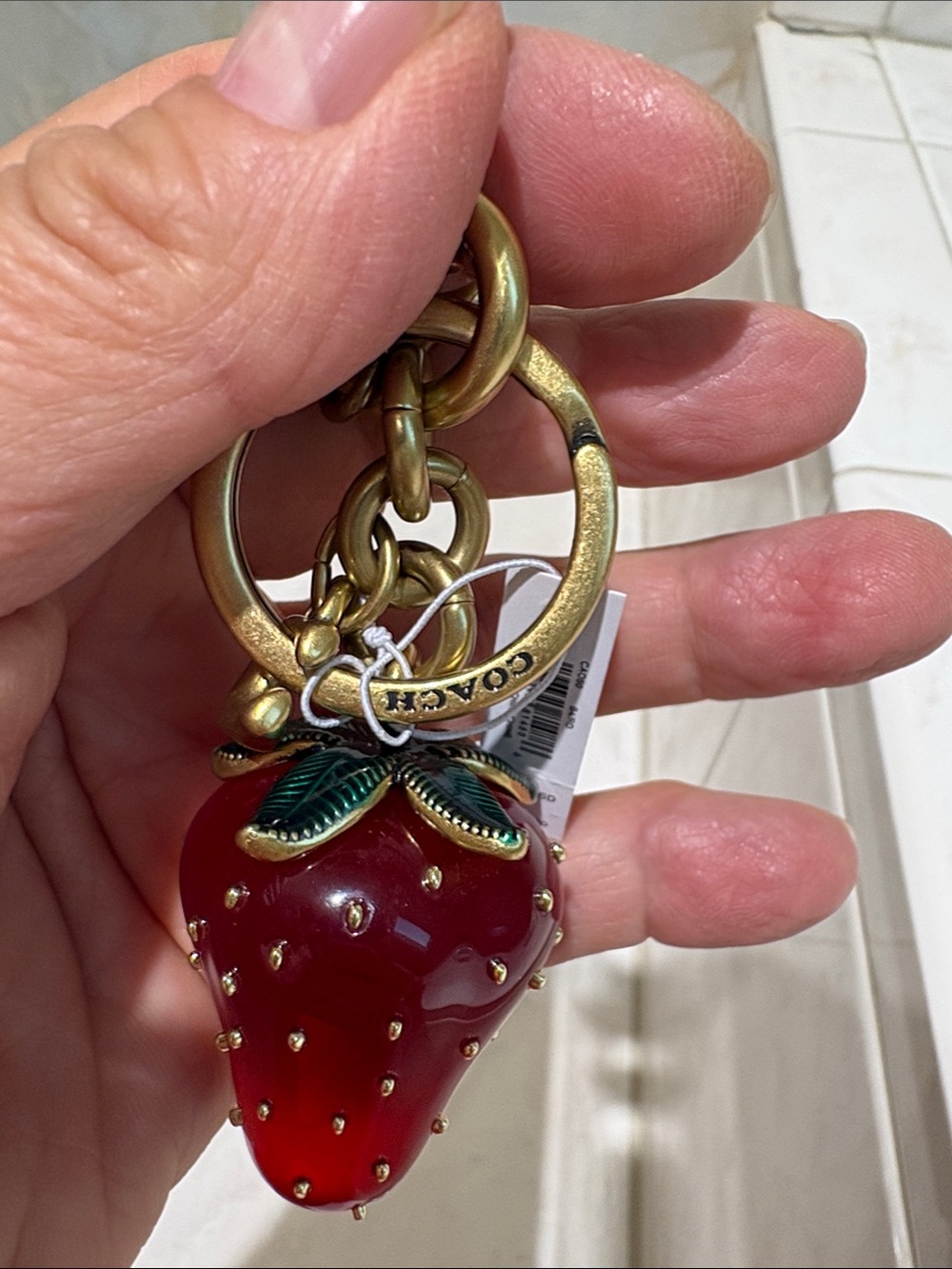 Coach Gold-Tone Strawberry Charm Keychain with Red Enamel Berry - Picture 3 of 5